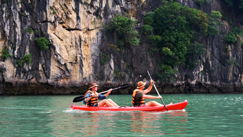 Guests kayaking on the bay