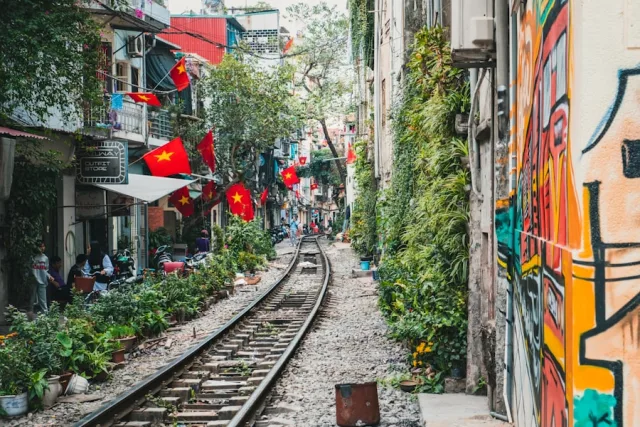 Railway tracks between buildings on Hanoi Train Street